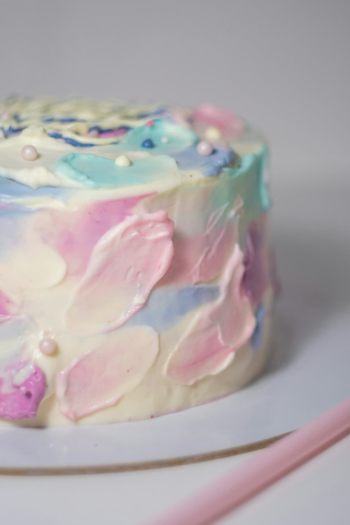 Cake finished with soft pastel palette-knife buttercream strokes